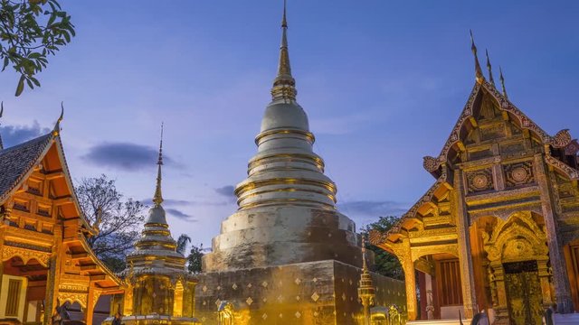 4K day to night Timelapse. People visiting Wat Phra Singh temple. The Wat Phra Singh in the old walled part of Chiang Mai is one of the best examples of classic Lanna style architecture in Thailand.