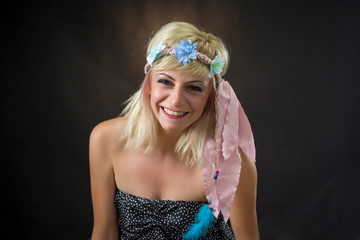 portrait of beautiful young woman wearing hippie headband