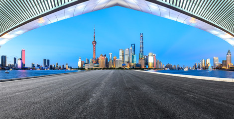 Empty asphalt road through Shanghai business district