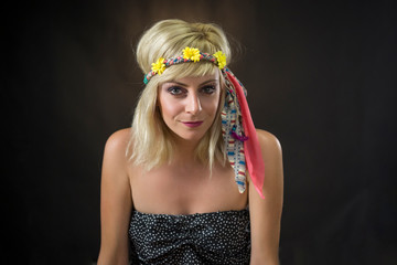 portrait of beautiful young woman wearing hippie headband