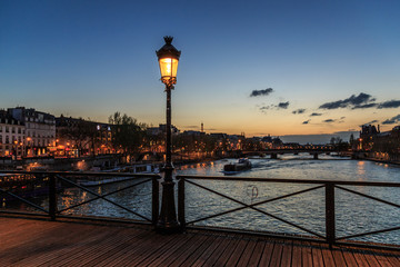 Pont des arts street lamp at night. Paris seine bridge with lantern. Morning river view