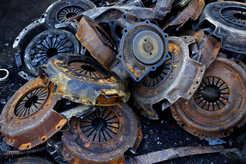 Rusty, old and broken car spare parts