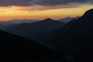 Naklejka na ściany i meble Spectacular Sunset of the Maluti Mountains in the Kingdom of Lesotho