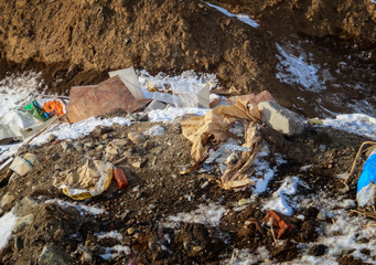 Garbage on the ground. Environmental pollution. Construction garbage. Grunge background