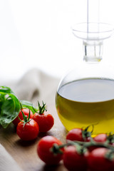 Cherry tomatoes with oil and basil