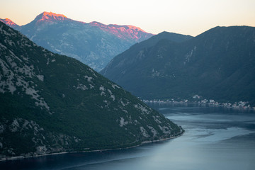 Sunset shot of beautiful mountains and the bay. Beautiful color and atmosphere