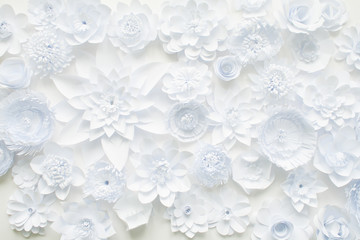 Obraz na płótnie Canvas White paper flowers on white background. Floral