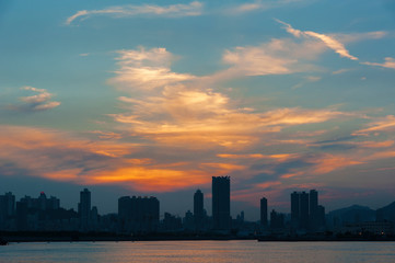 Skyline of Hong Kong city under sunset