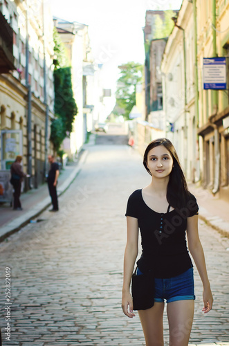 Cute teens wlking down the street