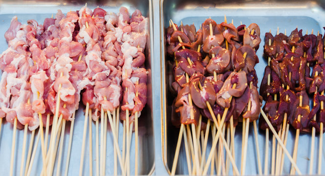 Mala BBQ in Thailand, meat or vegetable grilled with Chinese mala spicky sauce at street market