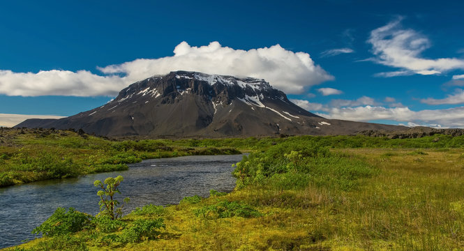 Herdubreid is a tuya in north-east Iceland It is situated in the Highlands of Iceland at the east side of the Odadahraun desert and close to Askja volcano