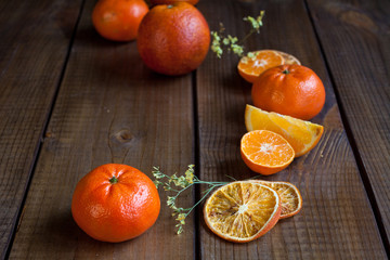 Ripe citrus fruits - oranges and tangerinnes.