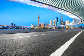 Empty asphalt road through Shanghai business district