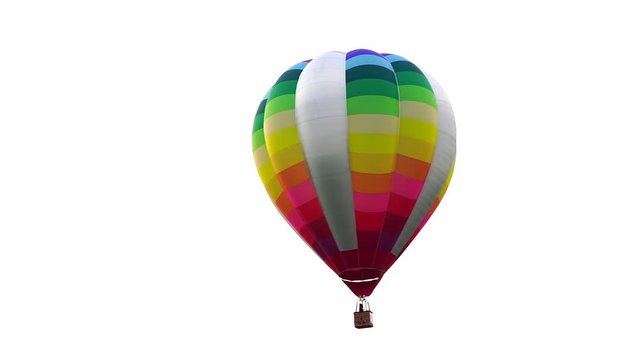 Colorful hot air balloons floating above the lake with white sky in Singha Park ,Chiang Rai, Thailand