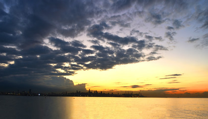 panoramic view of Beirut cityskyline under the dramatic sky of dusk on the mediterranean sea