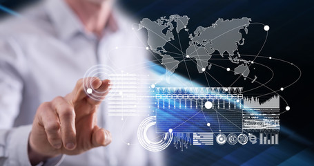 Man touching a global business digital interface concept
