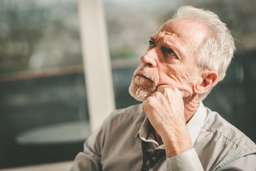 Thoughtful senior businessman