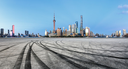 Empty asphalt square ground with panoramic city skyline in Shanghai,China