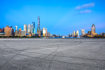 Empty asphalt square ground with panoramic city skyline in Shanghai,China