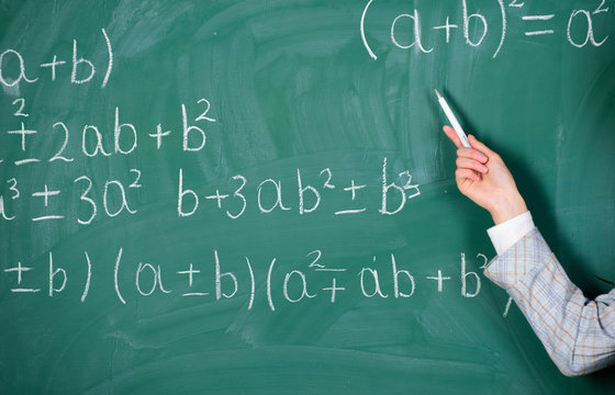 teacher on school lesson at blackboard. Back to school. Teachers day. Study and education. Modern school. Knowledge day. School. Home schooling. woman hand in classroom. i will help you. explane