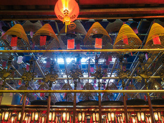 Incense coils and hinese lanterns inside the Man Mo temple, Hong Kong Island - 252829247