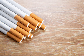 Cigarettes on a wooden background