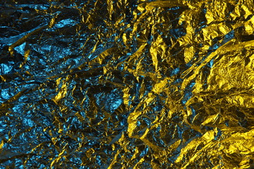 abstract background metal aluminum foil blue and yellow gold color