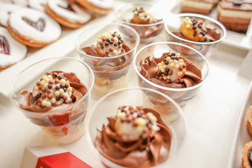 Chocolate cream dessert in a cup, selective focus