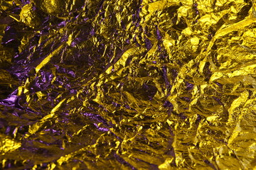 abstract background metal aluminum foil gold yellow and purple colors