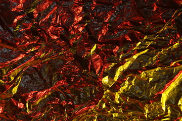 abstract background metal aluminum foil gold yellow and red colors