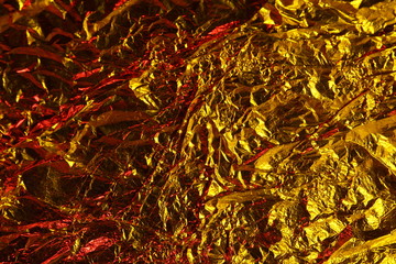 abstract background metal aluminum foil gold yellow and red colors