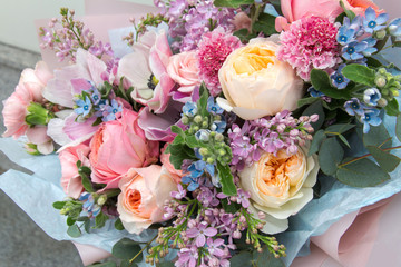 Beautiful rich elegant wedding pink bouquet, flowers arrangement by florist with roses, lilac and...