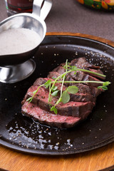Grilled beef steak on frying pan