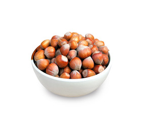 Hazelnuts in a bowl isolated on white background