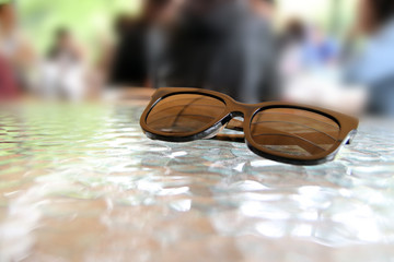 Fototapeta na wymiar Sunglasses on a table