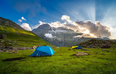 Sunrise moment with tent backpacker