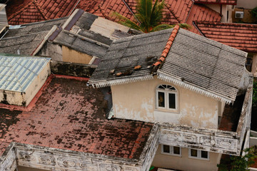 Aerial drone shoot above the architecture of Colombo, Sri Lanka. Modern and antuque houses. Ocean...