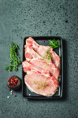 Raw cutlets on sheet pan.Top view, space for text.