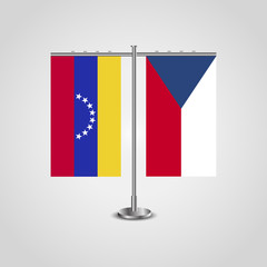 Table stand with flags of Venezuela and Czech Republic. Two flag. Flag pole. Symbolizing the cooperation between the two countries. Table flags