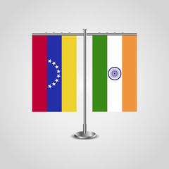 Table stand with flags of Venezuela and India. Two flag. Flag pole. Symbolizing the cooperation between the two countries. Table flags