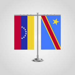 Table stand with flags of Venezuela and Democratic Republic of the Congo. Two flag. Flag pole. Symbolizing the cooperation between the two countries. Table flags