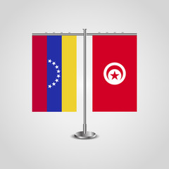 Table stand with flags of Venezuela and Tunisia. Two flag. Flag pole. Symbolizing the cooperation between the two countries. Table flags