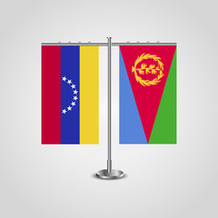 Table stand with flags of Venezuela and Eritrea. Two flag. Flag pole. Symbolizing the cooperation between the two countries. Table flags