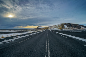 driving through iceland with empty highway