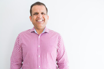 Fototapeta premium Middle age man wearing business shirt over white wall with a happy and cool smile on face. Lucky person.