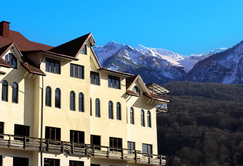 Residential house on a background of mountains