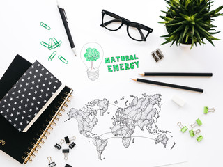 Business background with different office supplies and sketches and notes on white table