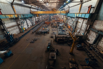 Industrial concept. A view from the bridge on construction site inside the manufacturing plate