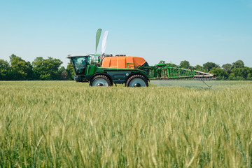 Self propelled sprayer applying pesticide