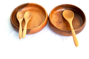 wood spoon and plate on white background